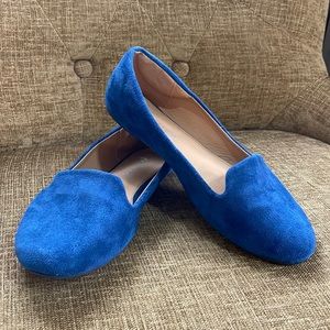 Woman’s blue flats